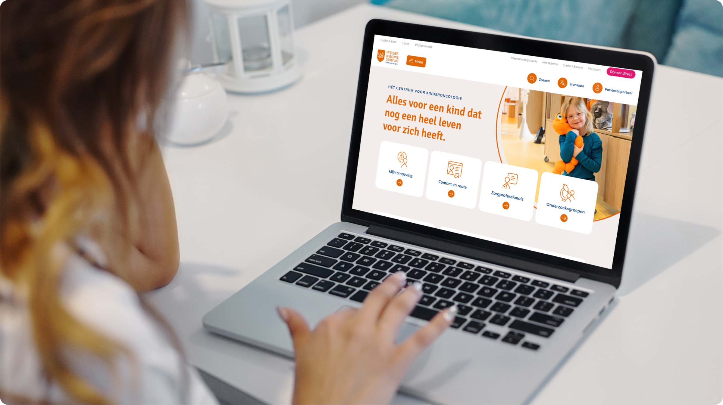 De vernieuwde website van het Prinses Máxima Centrum op een laptop